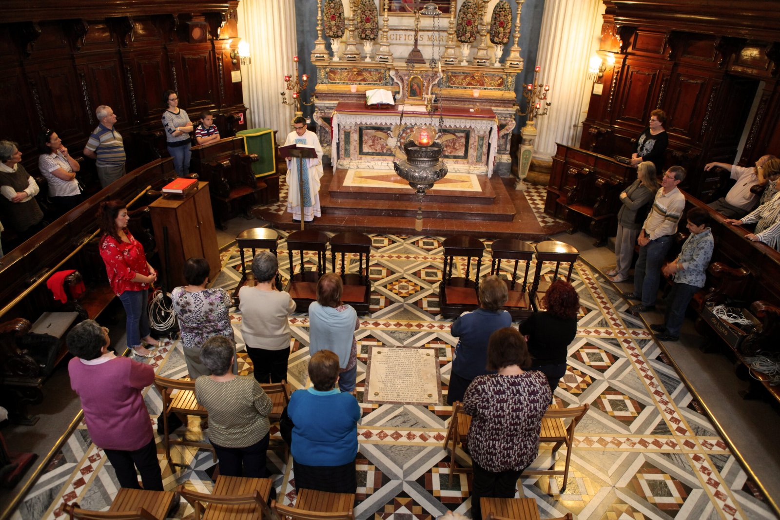 Group attending private mass Mosta Dome